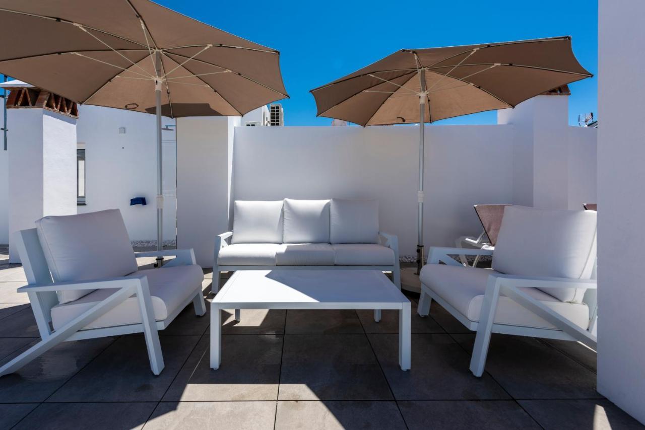 Apartamentos Toboso Plaza Нерха Экстерьер фото Rooftop lounge at the Hotel